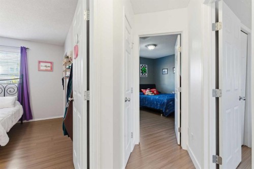 74 Evansbrooke Way Nw, Calgary, AB - Indoor Photo Showing Bedroom