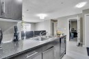 213-355 Taralake Way Ne, Calgary, AB  - Indoor Photo Showing Kitchen With Double Sink 