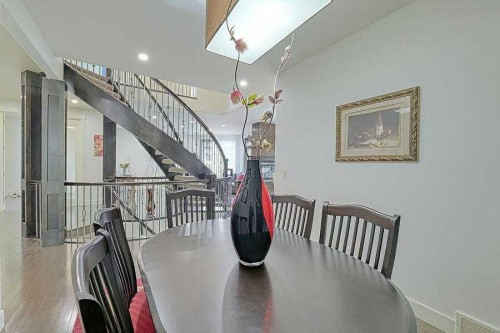 16 Rockcliff Point Nw, Calgary, AB - Indoor Photo Showing Dining Room