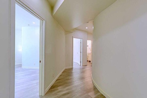 16 Rockcliff Point Nw, Calgary, AB - Indoor Photo Showing Other Room