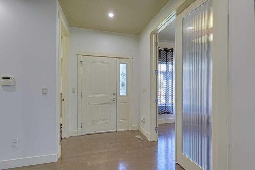 16 Rockcliff Point Nw, Calgary, AB - Indoor Photo Showing Other Room