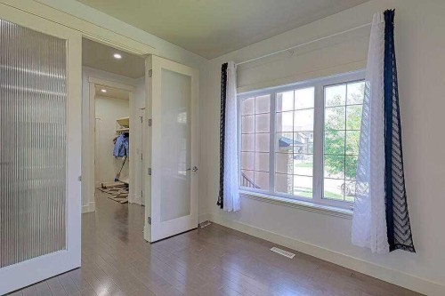 16 Rockcliff Point Nw, Calgary, AB - Indoor Photo Showing Other Room