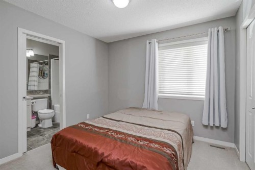 52 Autumn Court Se, Calgary, AB - Indoor Photo Showing Bedroom