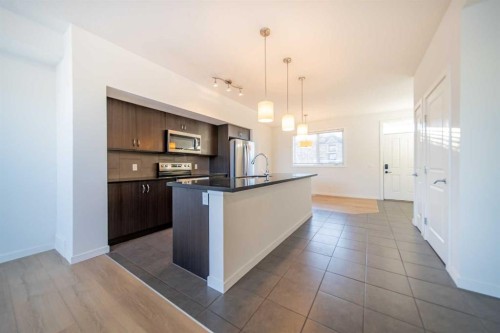 234 Cranston Way Se, Calgary, AB - Indoor Photo Showing Kitchen