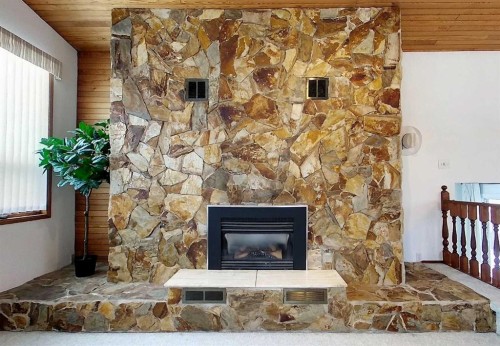 5402 12 Avenue, Edson, AB - Indoor Photo Showing Living Room With Fireplace