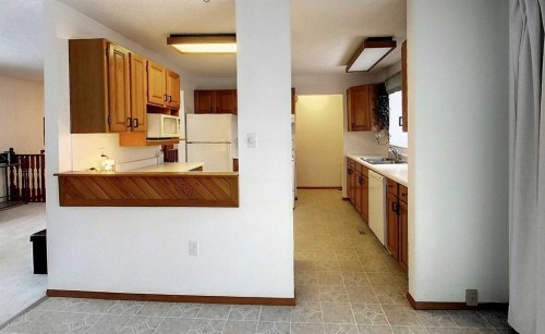 5402 12 Avenue, Edson, AB - Indoor Photo Showing Kitchen With Double Sink