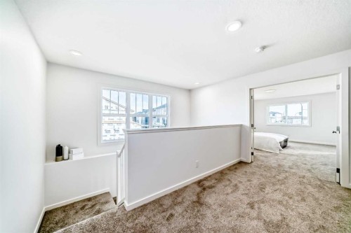 59 Versant Way Sw, Calgary, AB - Indoor Photo Showing Other Room
