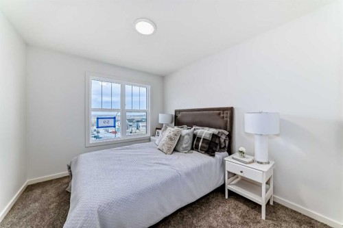 59 Versant Way Sw, Calgary, AB - Indoor Photo Showing Bedroom