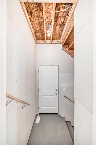 59 Versant Way Sw, Calgary, AB - Indoor Photo Showing Other Room