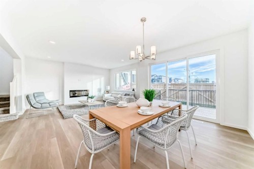 59 Versant Way Sw, Calgary, AB - Indoor With Fireplace