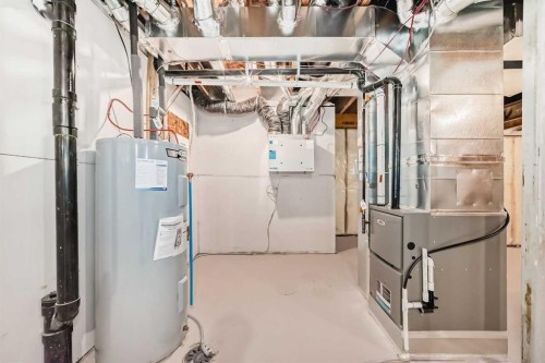 59 Versant Way Sw, Calgary, AB - Indoor Photo Showing Basement