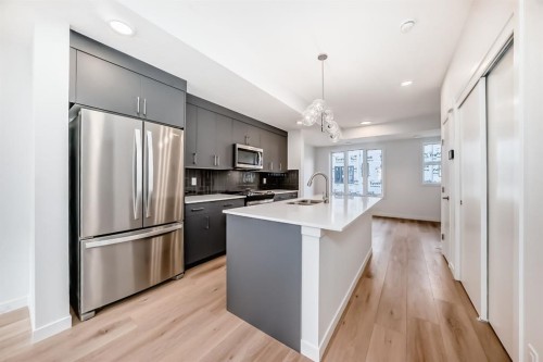 128 Arbour Lake Court, Calgary, AB - Indoor Photo Showing Kitchen With Upgraded Kitchen