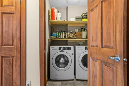 319-170 Crossbow Place, Canmore, AB - Indoor Photo Showing Laundry Room