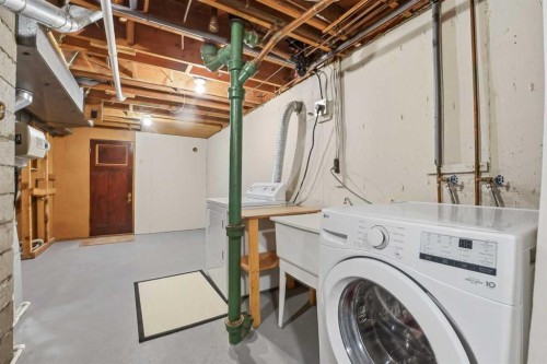 67 Woodlark Drive Sw, Calgary, AB - Indoor Photo Showing Laundry Room