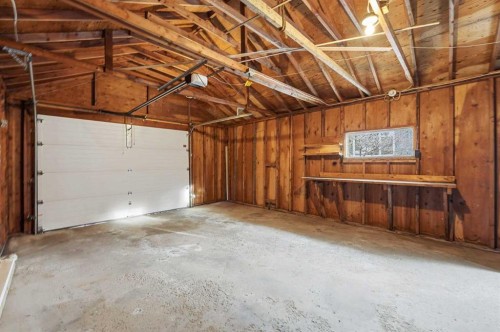 67 Woodlark Drive Sw, Calgary, AB - Indoor Photo Showing Garage