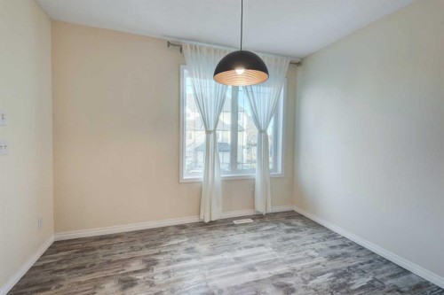 168 Simcoe Place Sw, Calgary, AB - Indoor Photo Showing Other Room