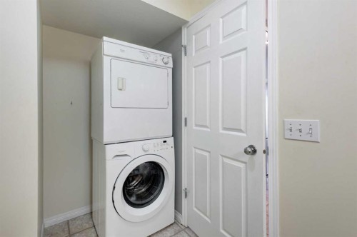 168 Simcoe Place Sw, Calgary, AB - Indoor Photo Showing Laundry Room