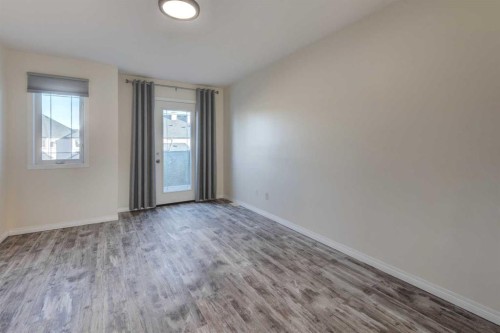 168 Simcoe Place Sw, Calgary, AB - Indoor Photo Showing Other Room