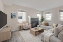 168 Simcoe Place Sw, Calgary, AB  - Indoor Photo Showing Living Room With Fireplace 