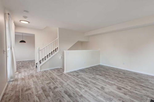 168 Simcoe Place Sw, Calgary, AB - Indoor Photo Showing Other Room