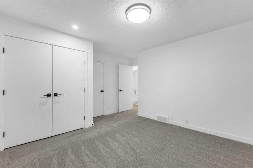 16 Faldale Close Ne, Calgary, AB - Indoor Photo Showing Other Room
