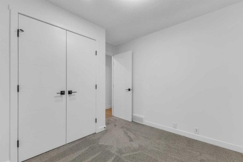 16 Faldale Close Ne, Calgary, AB - Indoor Photo Showing Other Room