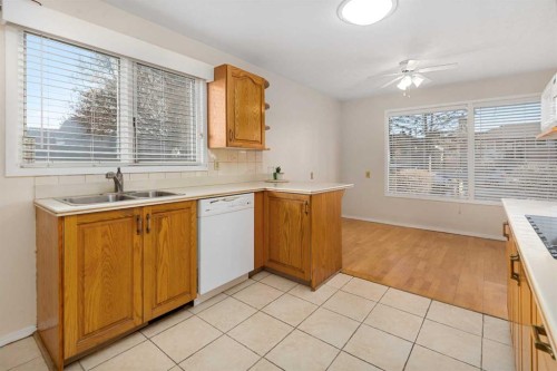 1423 18A Street Ne, Calgary, AB - Indoor Photo Showing Kitchen With Double Sink