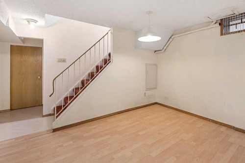 1423 18A Street Ne, Calgary, AB - Indoor Photo Showing Other Room