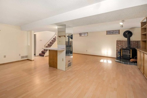 1423 18A Street Ne, Calgary, AB - Indoor With Fireplace