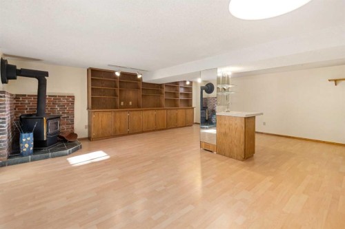 1423 18A Street Ne, Calgary, AB - Indoor With Fireplace