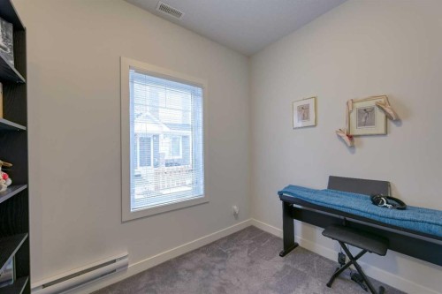 518 Canals Crossing, Airdrie, AB - Indoor Photo Showing Other Room