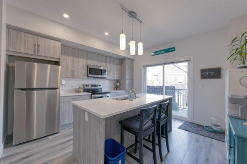 518 Canals Crossing, Airdrie, AB - Indoor Photo Showing Kitchen With Stainless Steel Kitchen