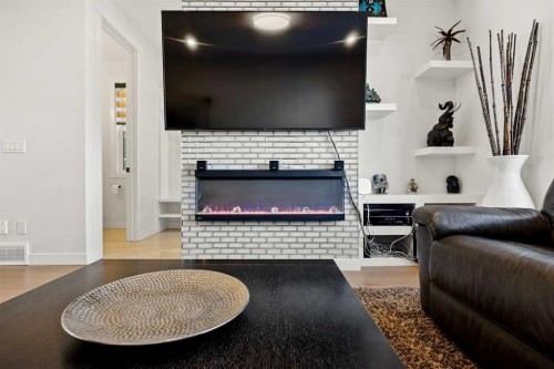 4635 79 Street Nw, Calgary, AB - Indoor Photo Showing Other Room With Fireplace