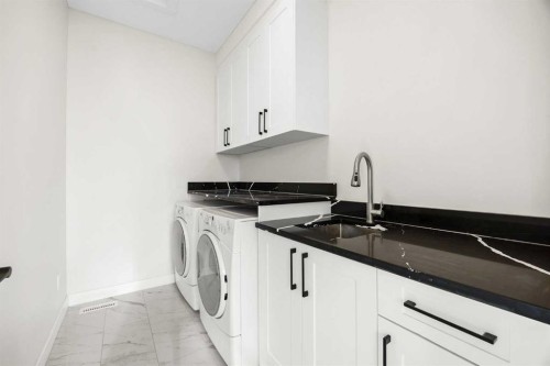 4635 79 Street Nw, Calgary, AB - Indoor Photo Showing Laundry Room