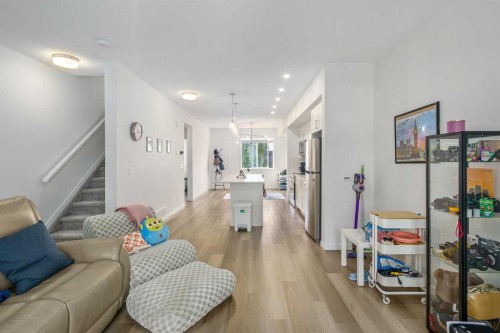 628 Copperstone Manor Se, Calgary, AB - Indoor Photo Showing Living Room