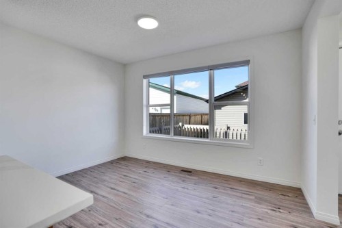 201 Copperstone Terrace Se, Calgary, AB - Indoor Photo Showing Other Room
