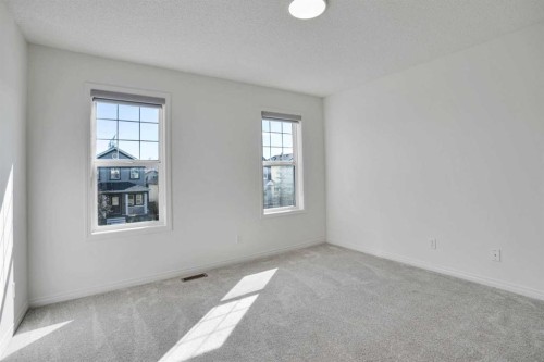 201 Copperstone Terrace Se, Calgary, AB - Indoor Photo Showing Other Room