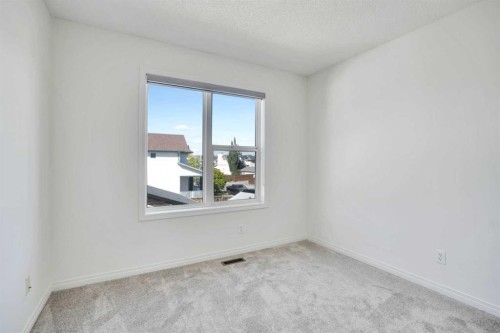 201 Copperstone Terrace Se, Calgary, AB - Indoor Photo Showing Other Room