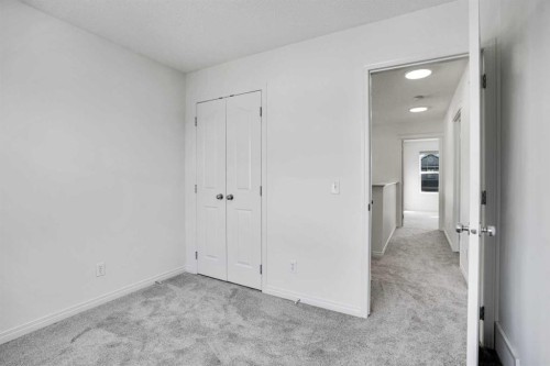 201 Copperstone Terrace Se, Calgary, AB - Indoor Photo Showing Other Room