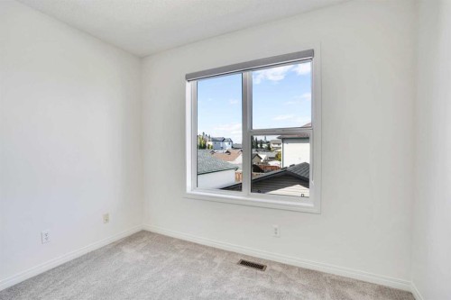 201 Copperstone Terrace Se, Calgary, AB - Indoor Photo Showing Other Room
