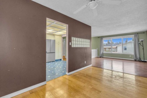 403 Queen Alexandra Way Se, Calgary, AB - Indoor Photo Showing Other Room
