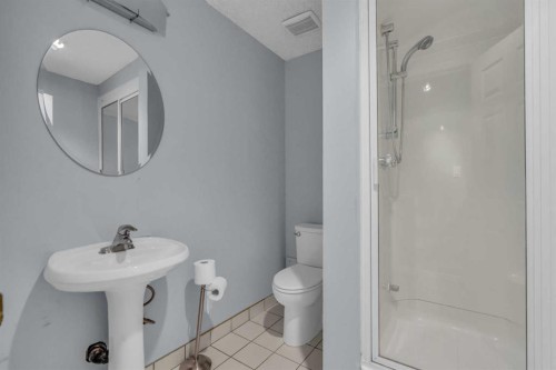 403 Queen Alexandra Way Se, Calgary, AB - Indoor Photo Showing Bathroom