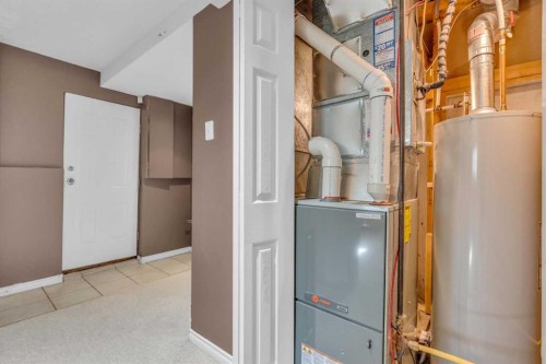 403 Queen Alexandra Way Se, Calgary, AB - Indoor Photo Showing Basement