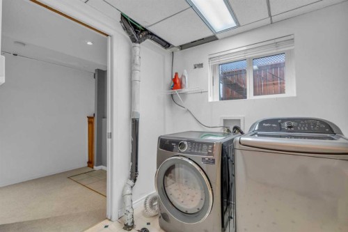 403 Queen Alexandra Way Se, Calgary, AB - Indoor Photo Showing Laundry Room