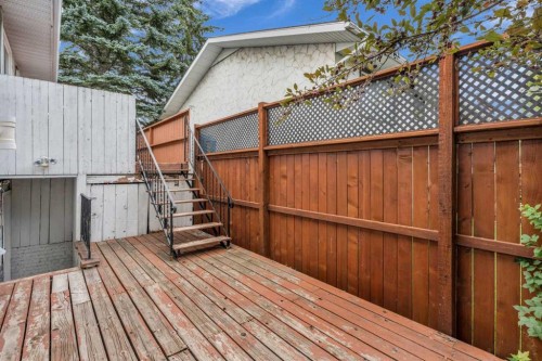 403 Queen Alexandra Way Se, Calgary, AB - Outdoor With Deck Patio Veranda With Exterior