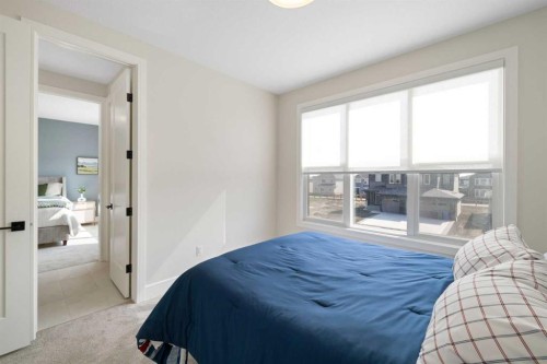 232 West Chestermere Drive, Chestermere, AB - Indoor Photo Showing Bedroom