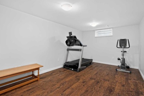 68 Cedarwood Hill Sw, Calgary, AB - Indoor Photo Showing Gym Room
