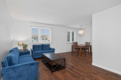 68 Cedarwood Hill Sw, Calgary, AB - Indoor Photo Showing Living Room
