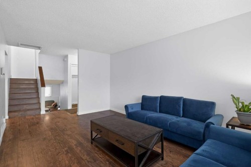 68 Cedarwood Hill Sw, Calgary, AB - Indoor Photo Showing Living Room