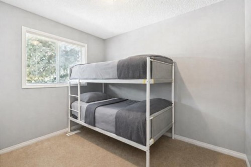 22 Country Hills Cove Nw, Calgary, AB - Indoor Photo Showing Bedroom